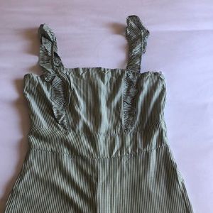 Green and white jumpsuit